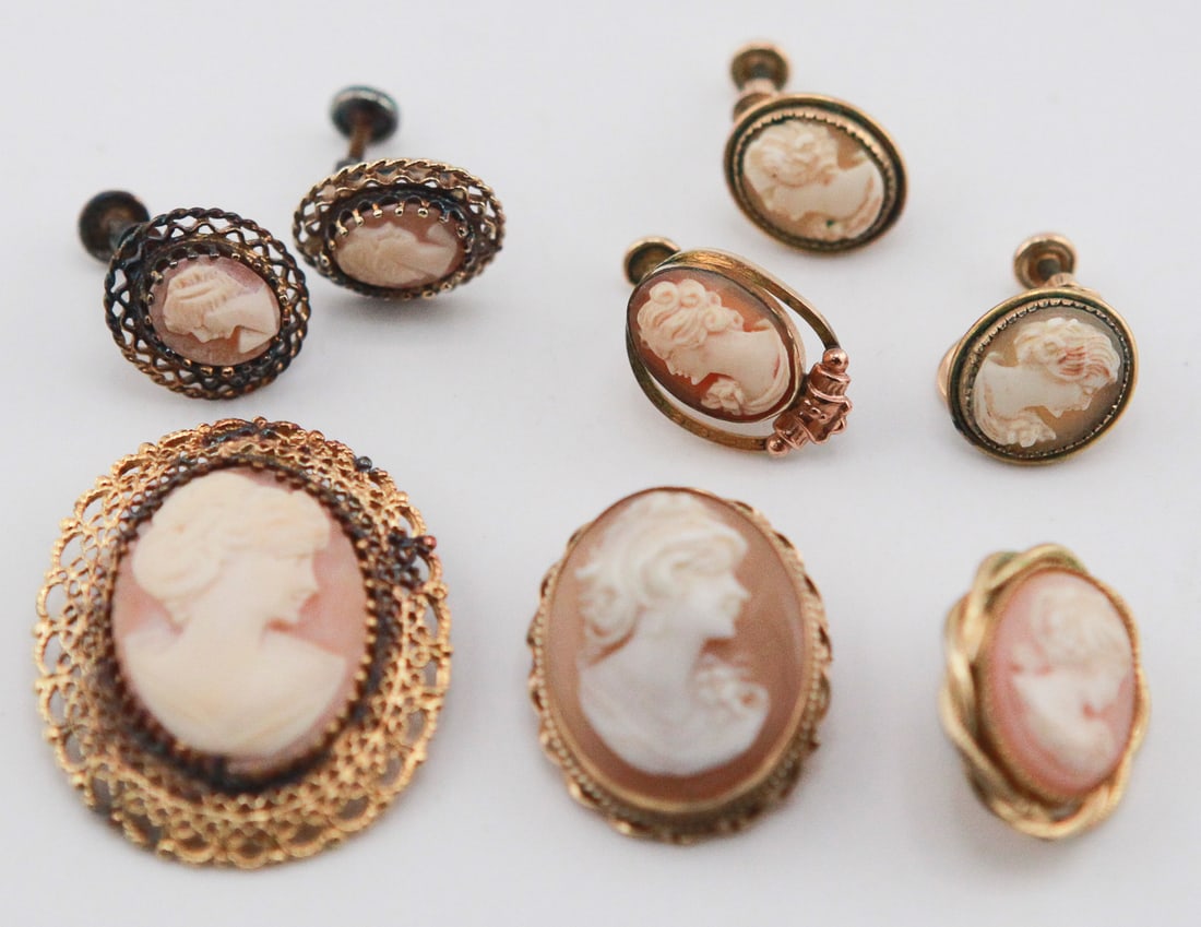 Lot of 8 Vintage Cameo Jewelry Pieces: Collection of eight vintage cameo jewelry pieces, including two pairs of screw-back cameo earrings, one cameo ring, and three cameo brooches. The lot features carved lady profile cameos in classic pin