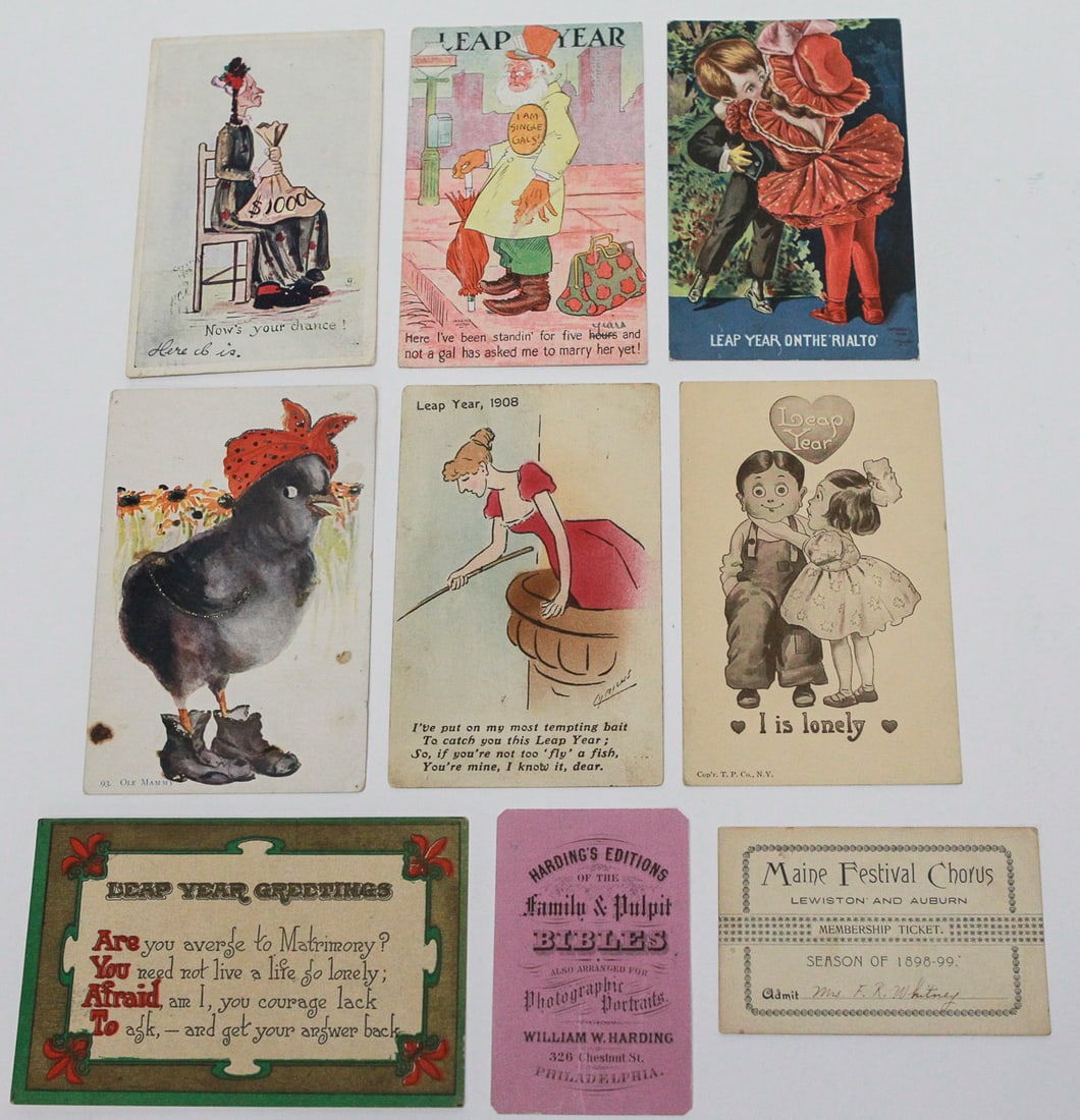 Lot of 9 Antique Leap Year and Novelty Cards: Collection of nine late 19th- to early 20th-century postcards and ephemera, including six humorous Leap Year and courtship cards, a period racial caricature postcard, Harding’s Family & Pulpit Bible