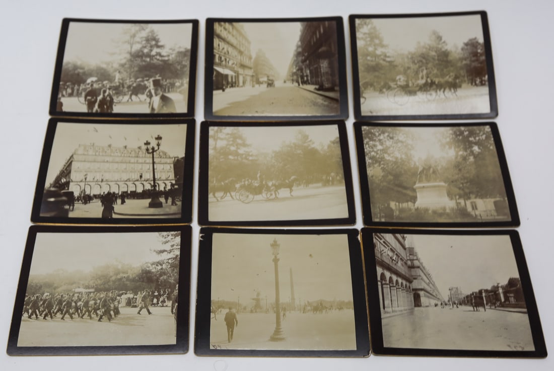 Lot of 9 Paris Street and Military Parade Photographs, c. 1919: Lot of nine antique gelatin silver photographs documenting Parisian streets and public gatherings around the end of World War I. The images depict mounted cavalry, marching soldiers, horse-drawn forma
