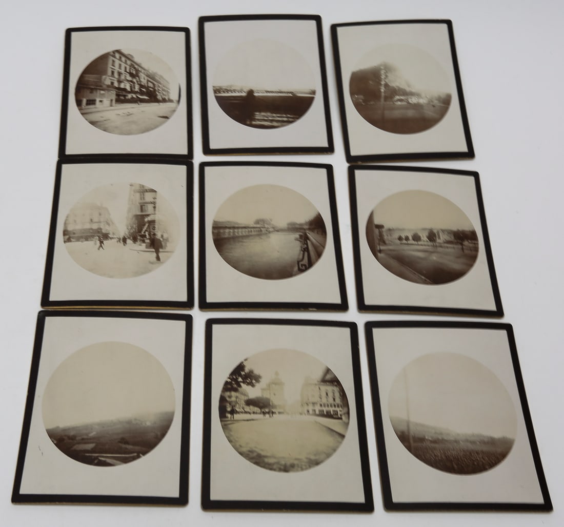 Lot of 9 Geneva Travel Photographs, c. 1910s: Lot of nine antique gelatin silver photographs documenting Geneva, Switzerland, and its surrounding landscape. The circular images depict city streets, bridges, riverfront promenades, public squares, 