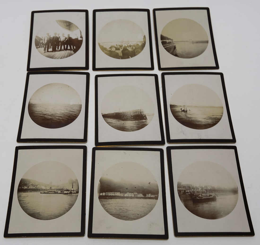 Lot of 9 English Channel and Rhine Travel Photographs, c. 1910s: Lot of nine antique gelatin silver photographs documenting a European river and coastal voyage. The circular images depict passengers aboard ship, English Channel views, small boats, piers, waterfront