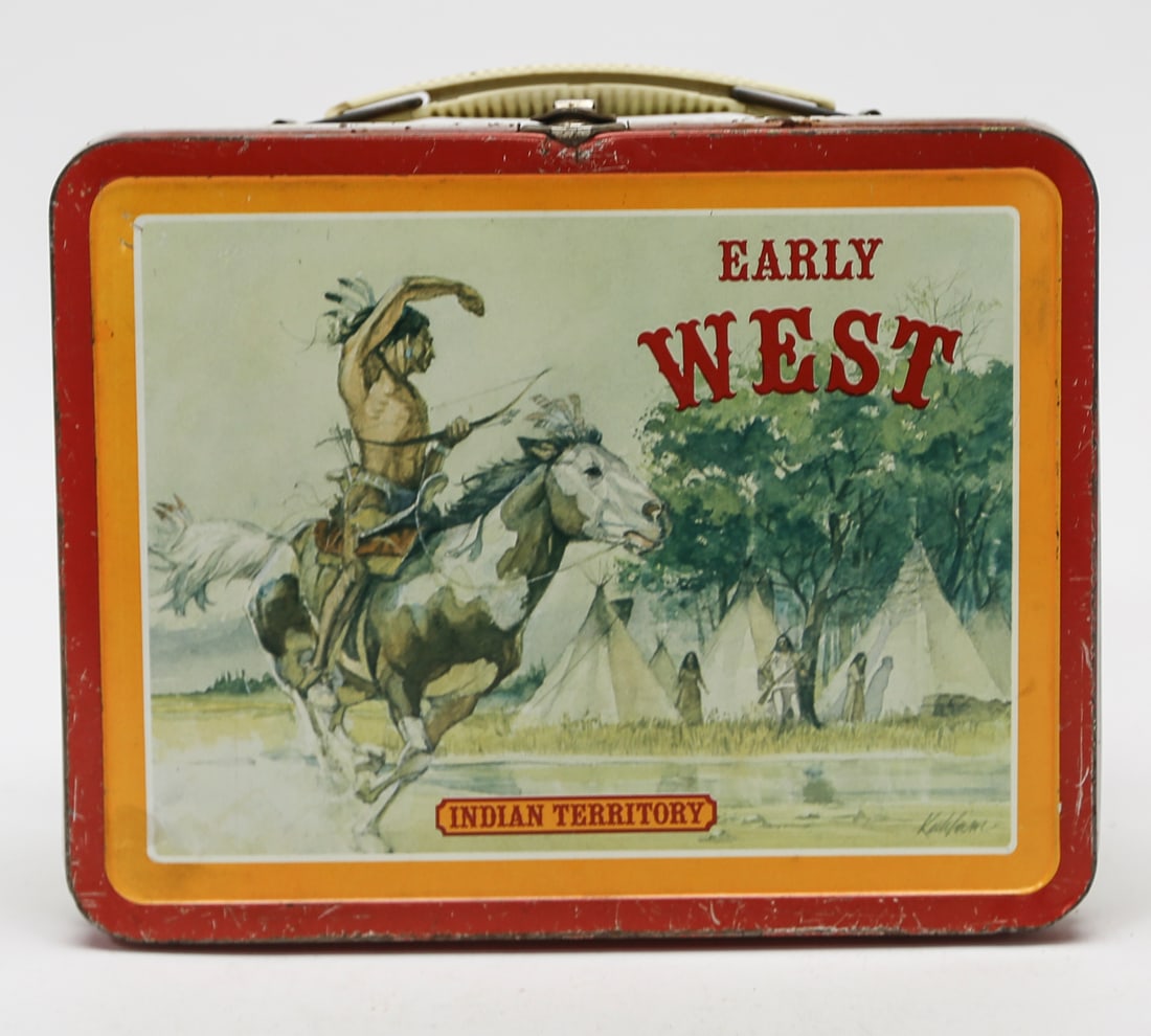 Vintage Early West Indian Territory Metal Lunch Box: A vintage Western-themed metal lunch box featuring Early West Indian Territory artwork with a mounted Native American figure, horses, teepees, and frontier imagery. The side panels are decorated with