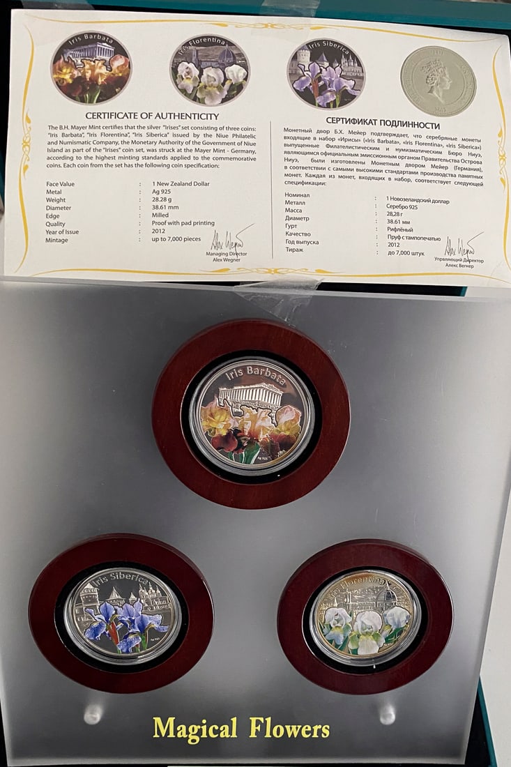 2012 Niue “Magical Flowers - Irises” 3-Coin Silver Proof Set: This beautifully presented 2012 “Magical Flowers – Irises” 3-coin silver proof set from Niue includes Iris Barbata, Iris Florentina, and Iris Siberica, each struck in .925 silver by the reno