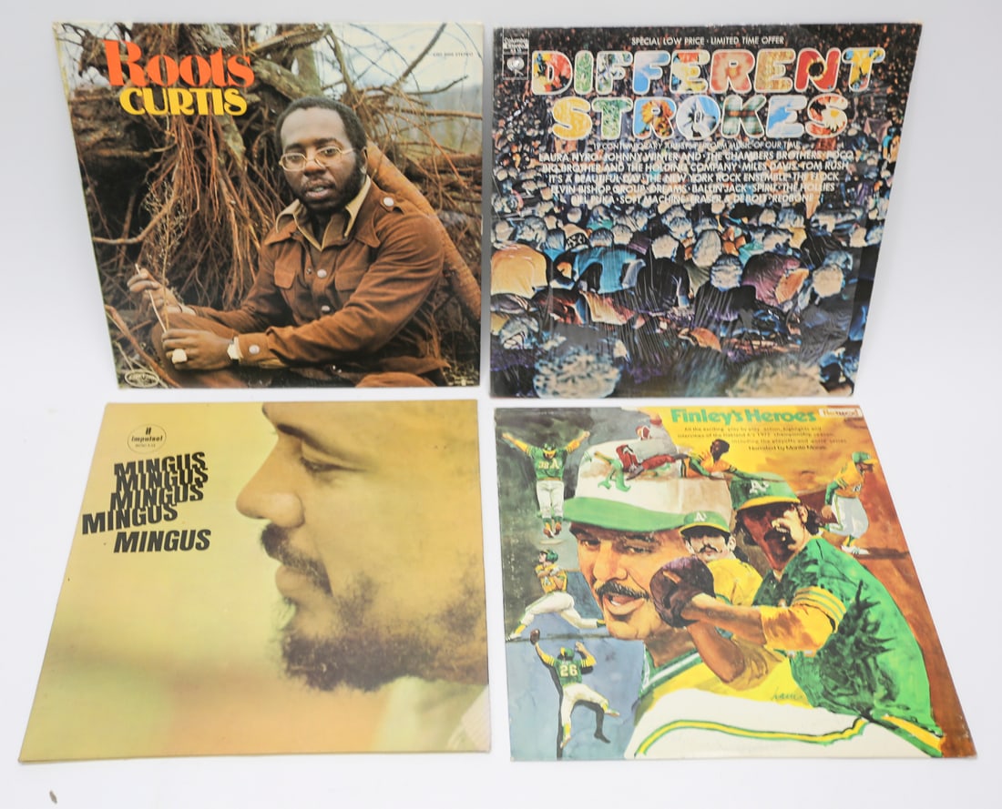 Vintage Soul Jazz and Rock Vinyl Records Lot of 4: Lot of four vintage vinyl records featuring Curtis Mayfield Roots, Charles Mingus Mingus Mingus Mingus Mingus, Different Strokes compilation album, and Finleys Heroes celebrating the Oakland Athletics