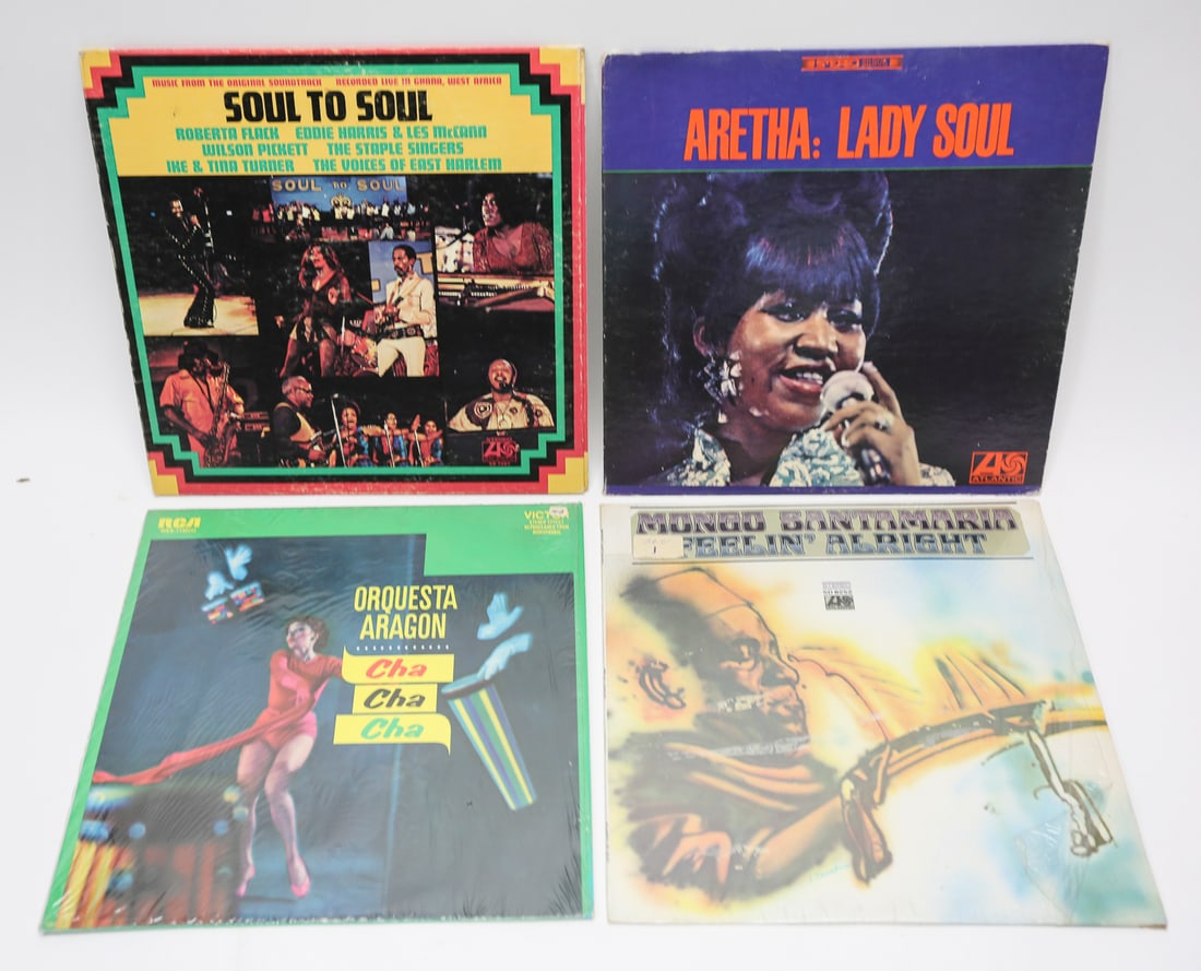 Vintage Soul Jazz and Latin Vinyl Records Lot of 4: Lot of four vintage vinyl records featuring Aretha Franklin Lady Soul, Mongo Santamaria Feelin Alright, Orquesta Aragon Cha Cha Cha, and the Soul to Soul original soundtrack recorded live in Ghana. A 