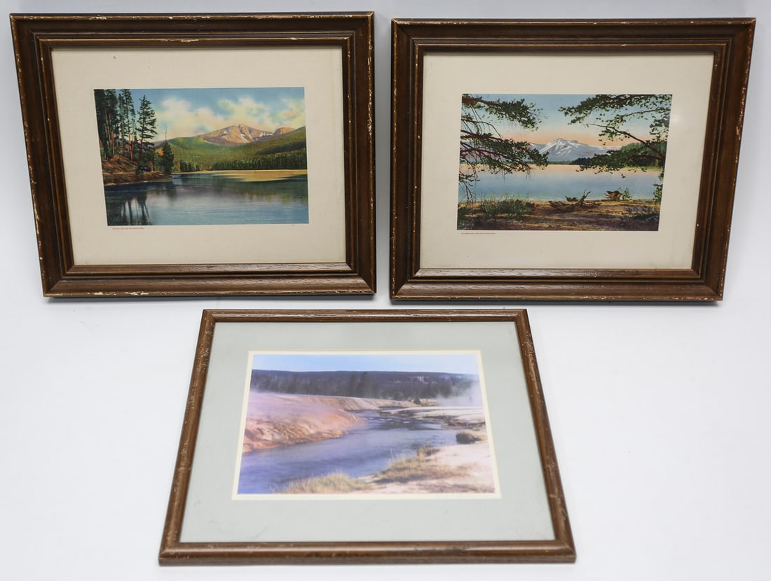 Framed National Park Landscape Prints Lot of 3: Lot of three framed landscape prints depicting scenic mountain lakes and waterways, including views of Crater Lake and Yellowstone National Park. From a Hollywood prop house. Each measures approximate