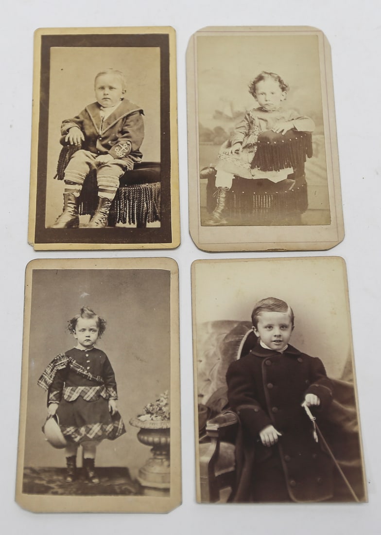 Antique Cabinet Card Child Portraits Lot of 4: Lot of four late 19th century cabinet card photographs depicting young children in Victorian period clothing, including seated and standing studio portraits. Photographer markings include Peru, Indian