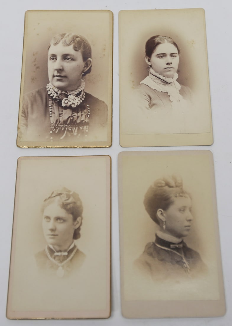Antique Cabinet Card Women Portraits Lot of 4: Lot of four late 19th century cabinet card photographs depicting young women in formal Victorian period clothing with detailed collars, jewelry, and period hairstyles. Photographer studio markings inc