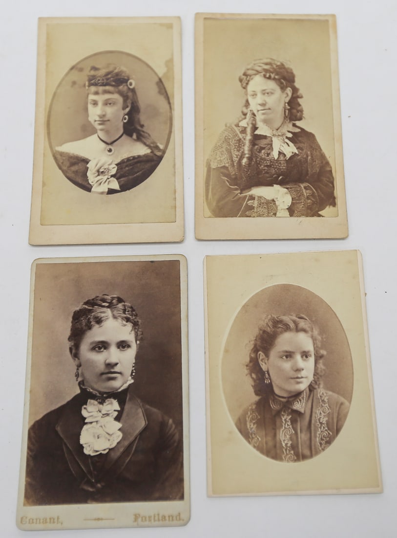 Antique Cabinet Card Portraits of Women Lot of 4: A collection of four antique cabinet card photographs depicting young women in formal Victorian studio portraits, featuring elaborate period hairstyles, jewelry, lace, and decorative clothing. Photogr