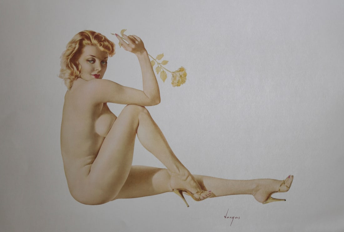 Alberto Vargas Limited Edition Blonde Pinup Lithograph: Limited edition lithograph on archival paper after Alberto Vargas depicting a seated blonde pinup holding a yellow rose and wearing gold high heeled sandals against a white background. Bearing the Var
