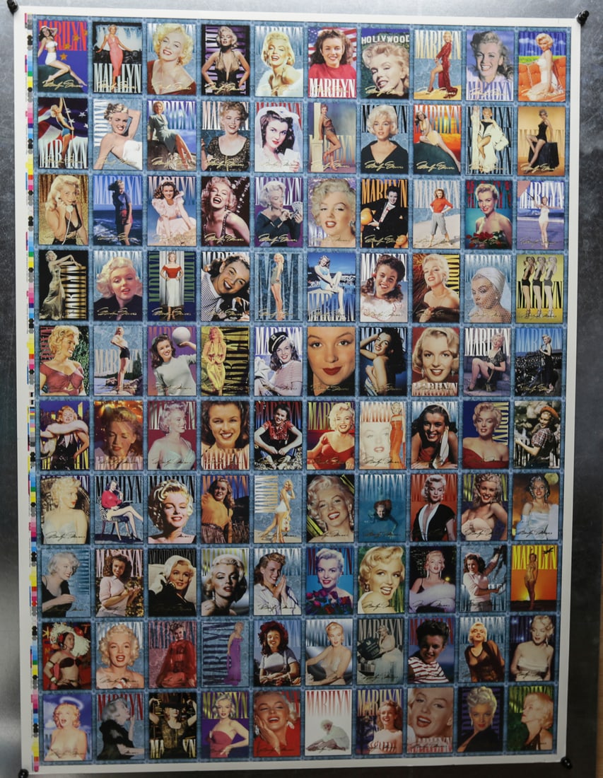 Marilyn Monroe Uncut Trading Card Sheet: Large double sided uncut trading card sheet featuring one hundred different images of Marilyn Monroe from throughout her life and film career. The front displays colorful portrait and pin up