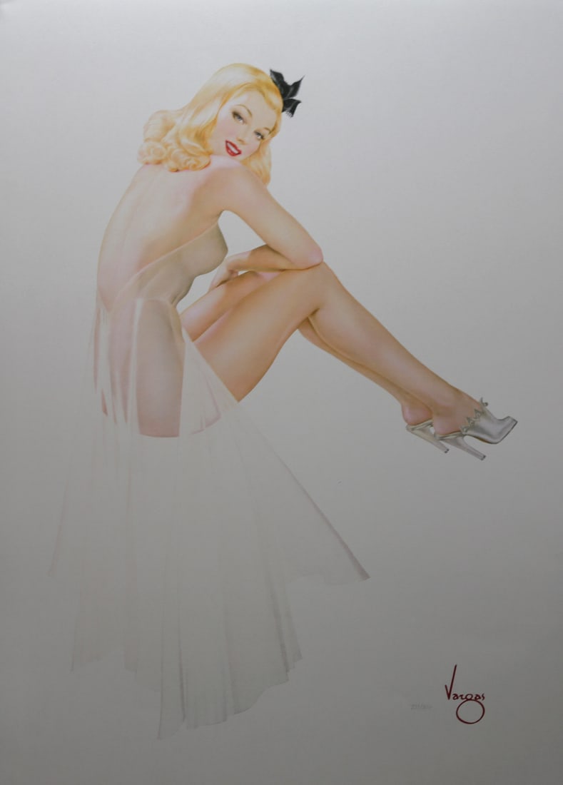 Alberto Vargas Seated Blonde Limited Edition Lithograph: Limited edition lithograph after Alberto Vargas depicting a glamorous seated blonde wearing a sheer pale pink gown, silver high heels, and a black hair bow. The composition reflects Vargas celebrated