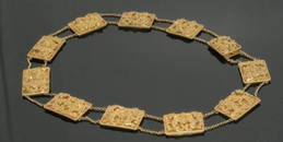 1654: An Indian gold filigree plaque necklace,