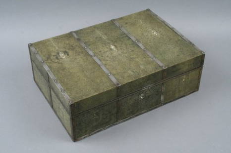 An Arts & Crafts shagreen box in the manner of Jo: An Arts & Crafts shagreen box in the manner of John Paul Cooper, the exterior applied with white metal strapwork, secured by fleur-de-lys rivets, the shagreen mounted onto all sides and base, with vel