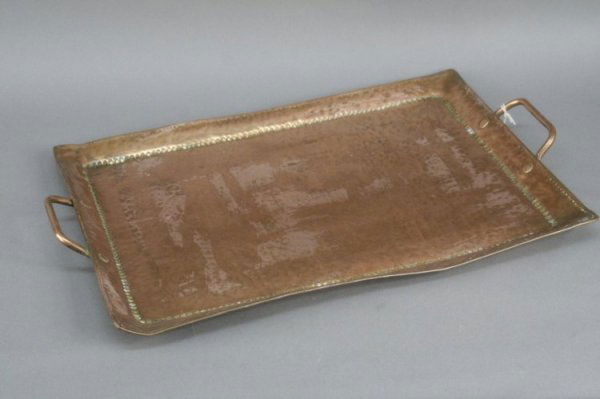 A John Pearson Arts & Crafts hammered copper tray,: A John Pearson Arts & Crafts hammered copper tray, with copper loop handles, 21.5ins