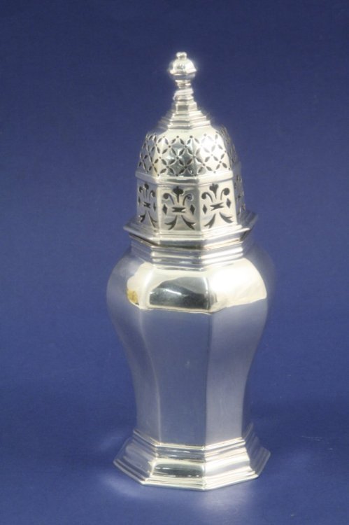 A George V Britannia standard silver baluster cas: A George V Britannia standard silver baluster caster, of octagonal form, Charles Stuart Harris, London 1910, 6.25ins