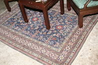 764: A Kuba blue ground rug, 4ft 7ins x 6ft 3ins