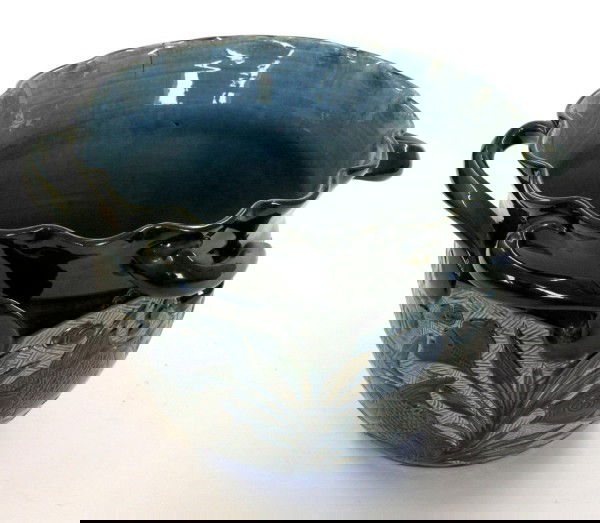 A Lauder jardiniere, 10.5ins diameter: A Lauder jardiniere, sprig-moulded with six scroll handles, the body incised, moulded and painted with a fish design predominantly in green, 10.5ins diameter