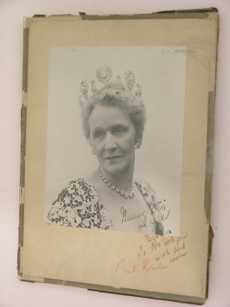 A signed black and white photograph of Nancy Astor: A signed black and white photograph of Nancy Astor by Cecil Beaton, head and shoulder portrait wearing a tiara with written inscription from Nancy Astor and later signature in pencil of Cecil Beaton 6