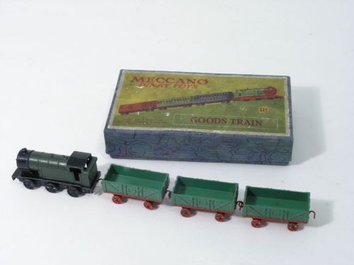 A rare, early Meccano Dinky Toys gift set, no. 18 G: A rare, early Meccano Dinky Toys gift set, no. 18 Goods Train, circa 1935, green and black six-wheeled locomotive and three green and red open wagons, on original blue-marbled box with printed label,