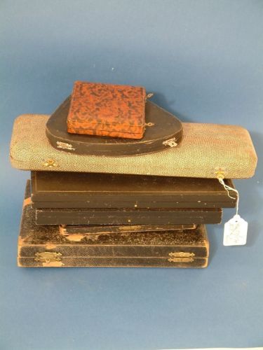 A cased set of six gilt metal and enamel teaspoon: A cased set of six gilt metal and enamel teaspoons, decorated in blue and pink with birds in flight, ten other similar servers, four cases of silver dessert knives and forks, and a set of six cocktail