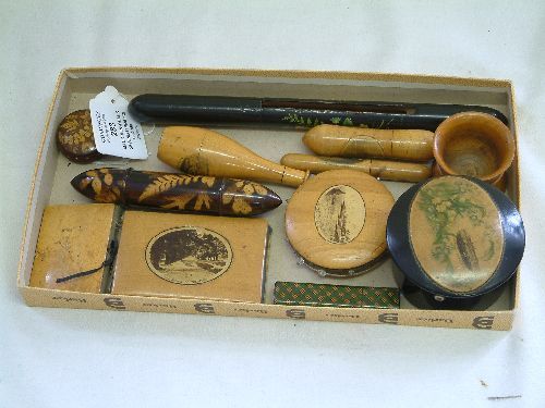 A collection of twelve mauchlinware and similarly: A collection of twelve mauchlinware and similarly decorated sewing related items including needle cases, pin cushions and a tartanware case