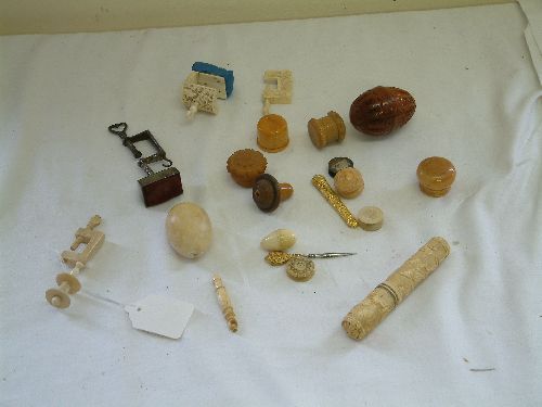 A Victorian steel pin cushion clamp,: A Victorian steel pin cushion clamp, others in ivory and bone, various spools, needle cases and waxers