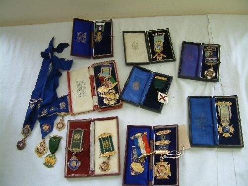 A cased 9ct. gold and enamel Buffaloes jewel 1931,: A cased 9ct. gold and enamel Buffaloes jewel 1931, a cased silver gilt and enamel masonic jewel with Victorian silver gilt set square suspension, another with Royal Coat of Arms, 4 other silver and en