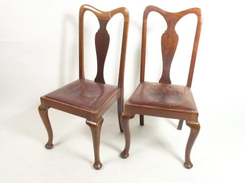 A set of six early 20th century George II design m: A set of six early 20th century George II design mahogany dining chairs, with vase shaped splats and leather upholstered seats on cabriole legs and pad feet