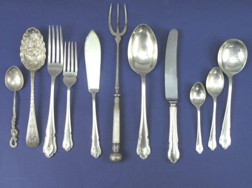 A ninety- piece canteen of EPNS flatware,: A ninety- piece canteen of EPNS flatware, made by John Taylor and Son, Sheffield, four berry spoons, various teaspoons, and a toasting fork,