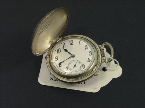 A Tallis Watch Co compressed 'golf' ball hunter p: A Tallis Watch Co compressed 'golf' ball hunter pocket watch with enamelled arabic dial.