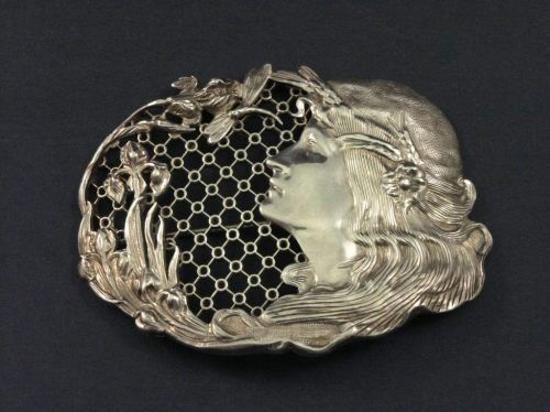 A large Art Nouveau silver brooch, 3.25ins x 2.25: A large Art Nouveau silver brooch, of a maiden's profile and dragonfly, set on lattice work, Birmingham 1900, makers mark AJS, possibly Arthur James Smith, 3.25ins x 2.25ins