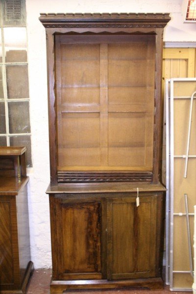 *A late Victorian carved oak bookcase, 3ft 2.5ins