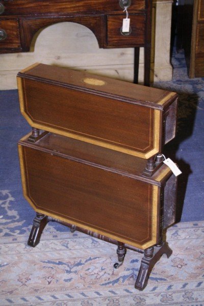 An Edwardian banded mahogany two tier Sutherland 