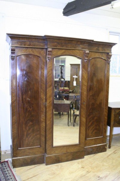 *A large Victorian mahogany breakfront three door