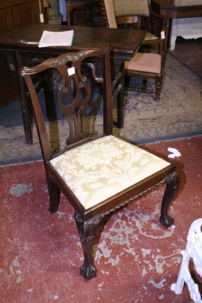 A George III mahogany Chippendale design dining c