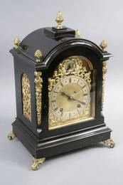 1196: *A late 19th century ebonised bracket clock in Ge