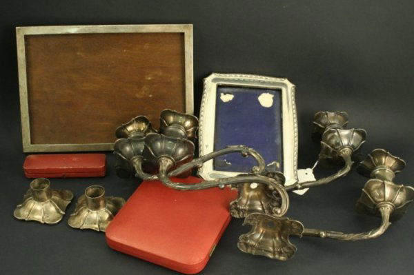 Two Edwardian silver two branch candelabra tops,: Two Edwardian silver two branch candelabra tops, Mappin & Webb, London, 1904 and two silver mounted photograph frames (a.f).