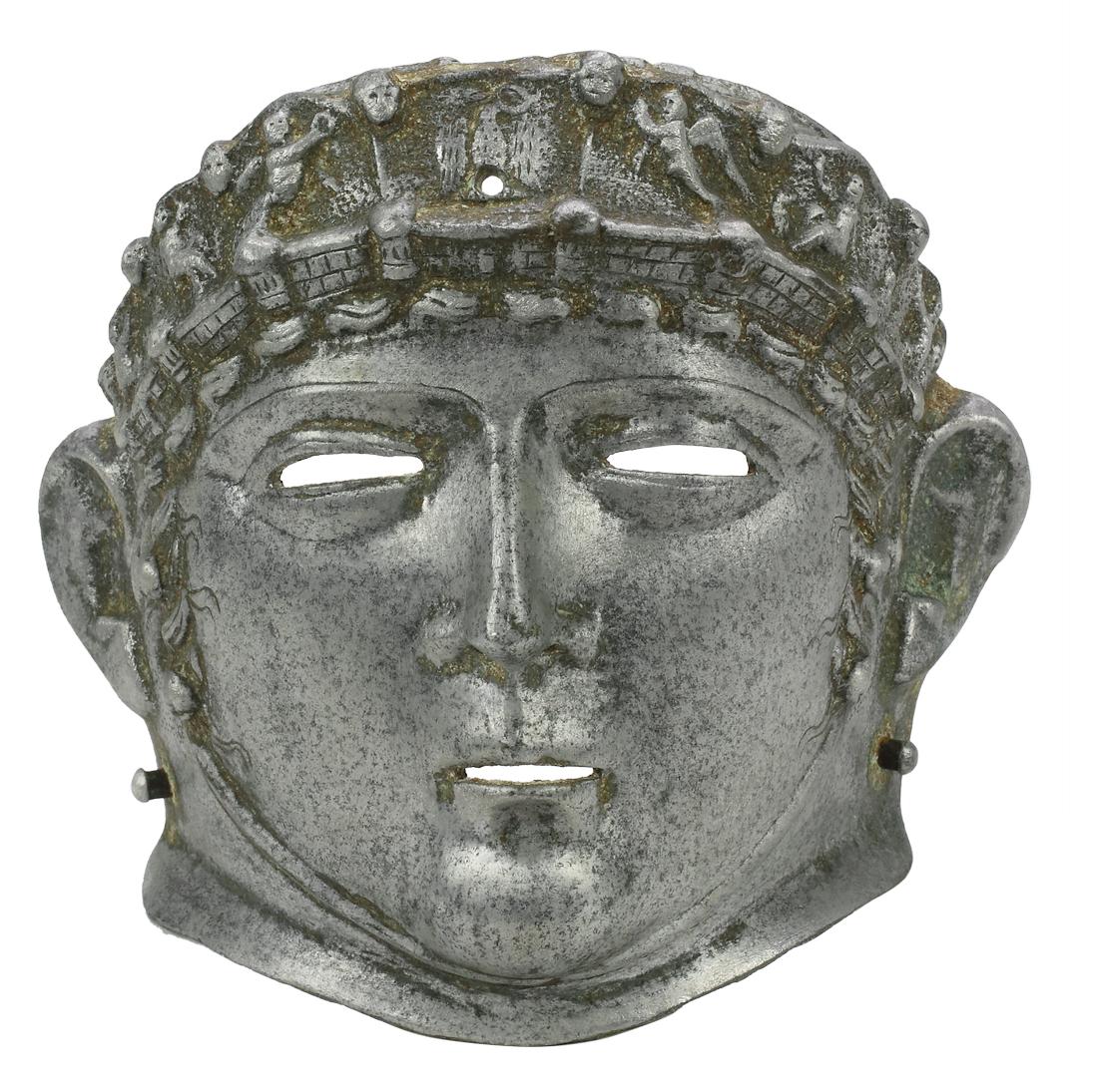 Replica Mask of a Roman Parade Helmet: Replica Mask of a Roman Parade Helmet, in the style of the 1st to 2nd Century, produced in the 20th or 21 Century, H 20,5cm, B 22,5cm, Condition: C (Please see our "Auction Terms and Info" for a compl