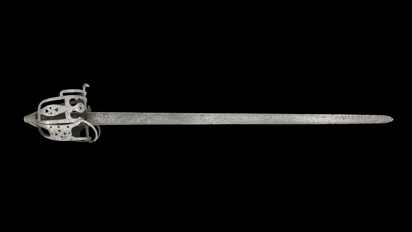 Scottish Highland Regiment Basket-Hilted Backsword, ca. 1770: Scottish Highland Regiment Basket-Hilted Backsword, ca. 1770, with tapering fullered blade double-edged towards the point and an iron basket-hilt typical of this type, made with flattened sheet-iron p