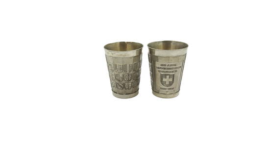 Lot of 2 Pewter Cups Commemorating 700 Years of Switzerland 1291 - 1991: Lot of 2 Pewter Cups Commemorating 700 Years of Switzerland 1291 - 1991, richly decorated in raised lettering, the front with "700 Anni Confoederatio Helvetica 1291-1991" together with the Swiss