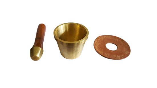 Bronze Mortar and Pestle, 20th Century: A large and heavy bronze mortar and pestle, the pestle features a robustly made hardwood handle with a solid bronze pulverizing tip and a unique leather lid that prevents dust from escaping the