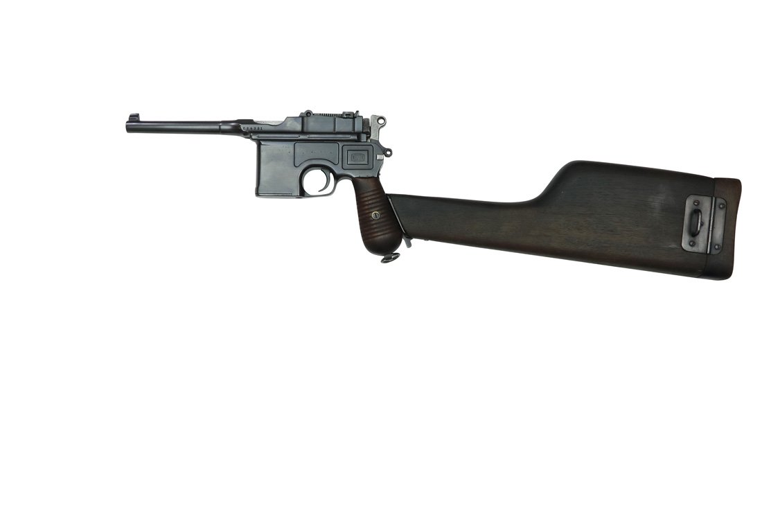 Mauser C96, Early Model 1930: Pistole, Mauser, C96, eine fruehe Ausfuehrung des Mod. 1930, Metallteile neu brueniert, Holzanschlagschaft mit sternfoermiger Beineinlage verziert, Kal. 7,63x25, #834391, Zustand: C+ [WES]
