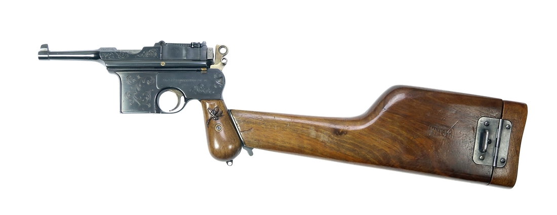 Pistole, Astra, C96 Composite: Pistole, Astra, im Stil einer Mauser C96, Kal. 7,63, #7428, eine aus Astra- und Mauserteilen angefertigte Kompositwaffe. Neu brÃ¼niert und mit Ranken graviert. Hartholzgriffschalen mit Ahornmotiven 