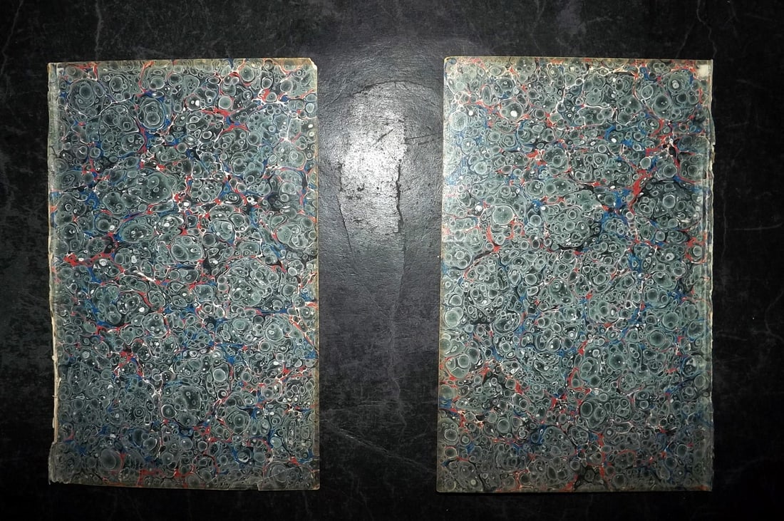 Old Paper Bookbinding 1839 Pair of Marble End Papers, 8vo: Pair of Marbled End Papers, made in Britain in 1839. 8vo. Paper Size: 7 x 4.5 inch (18 x 11.5cm) Tiny edge tear and corner wrinkle on one. Good Condition