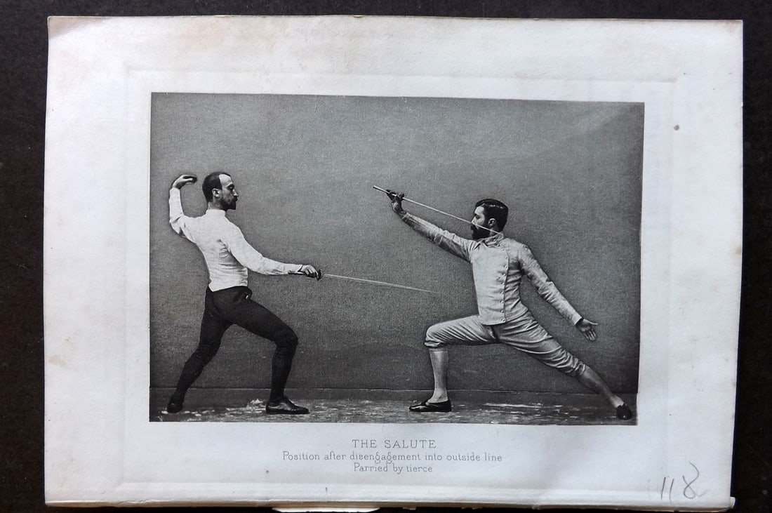 Badminton Library 1889 Antique Sword Fencing Print. The Salute. Position after disengagement.: Antique Photogravure Published 1889, London for "The Badminton Library of Sports and Pastimes..." by Walter H. Pollock, E. B. Michell, and Walter Armstrong.Paper Size: 7.5 x 5 inch (19 x 13cm) Ink lib
