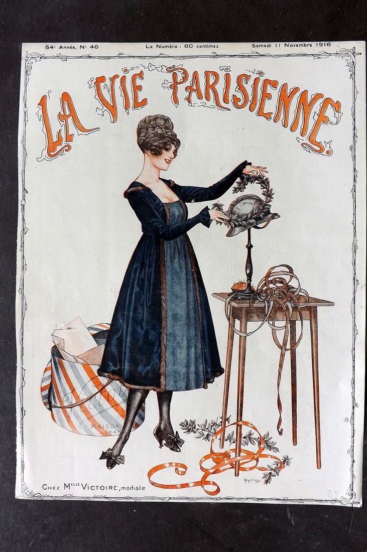 La Vie Parisienne 1916 Art Deco Print. Chez Melle Victoire modiste by Herouard: Lithograph Published 1928, Paris for "La Vie Parisienne" Illustrated by Lissac, Barbier, Vallet, Valee, Prejelan, Herouard, Fournier, Kuhn-Regnier, Georges L?onnec and others. Verso text, but none sho