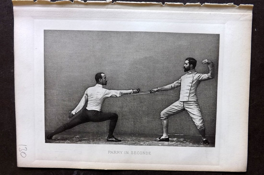 Badminton Library 1889 Antique Sword Fencing Print. Parry in Seconde.: Photogravure Published 1889, London for "The Badminton Library of Sports and Pastimes..." by Walter H. Pollock, E. B. Michell, and Walter Armstrong.Paper Size: 7.5 x 5 inch (19 x 13cm) Good Condition
