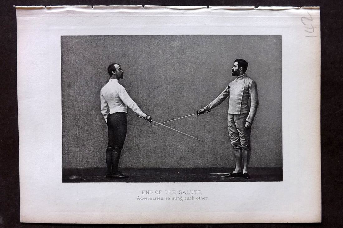 Badminton Library 1889 Antique Sword Fencing Print. End of the Salute.: Photogravure Published 1889, London for "The Badminton Library of Sports and Pastimes..." by Walter H. Pollock, E. B. Michell, and Walter Armstrong.Paper Size: 7.5 x 5 inch (19 x 13cm) Good Condition