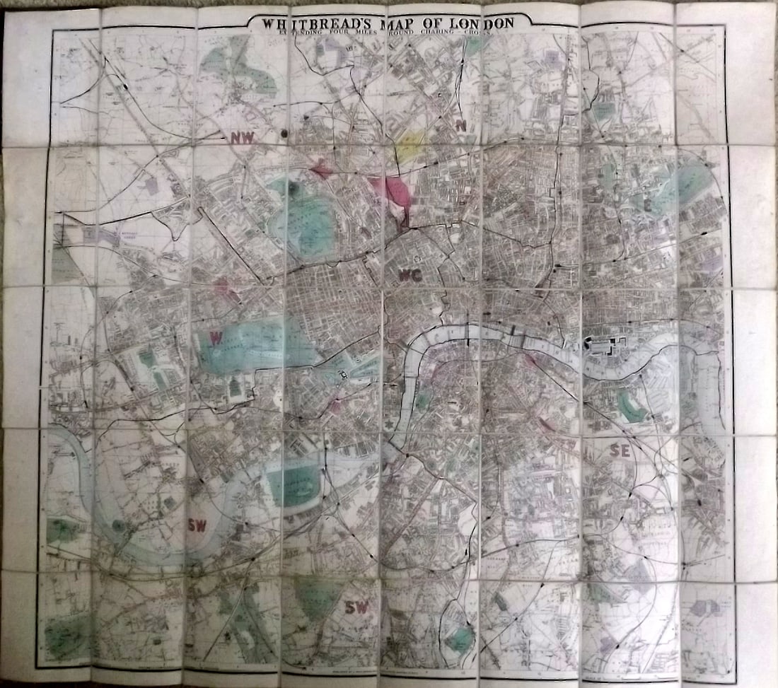 London - Whitbread, Josiah 1875 Large Folding HC Map: "Whitbread's Map of London extending Four Miles round Charing Cross" by Josiah Whitbread. Published by 1875 by Whitbread, London. Large Hand Colored Foliding Map on 40 Panels and Linen backed as issue